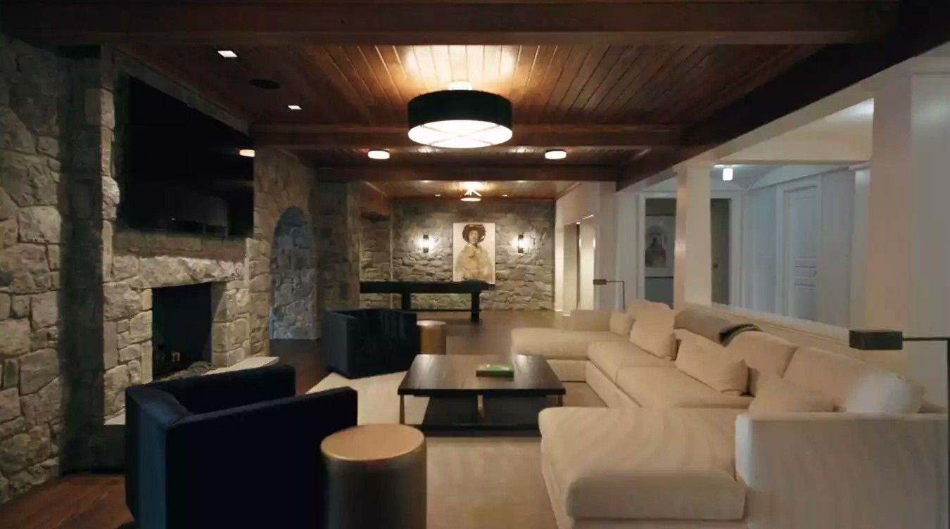 A living room filled with furniture and a fireplace