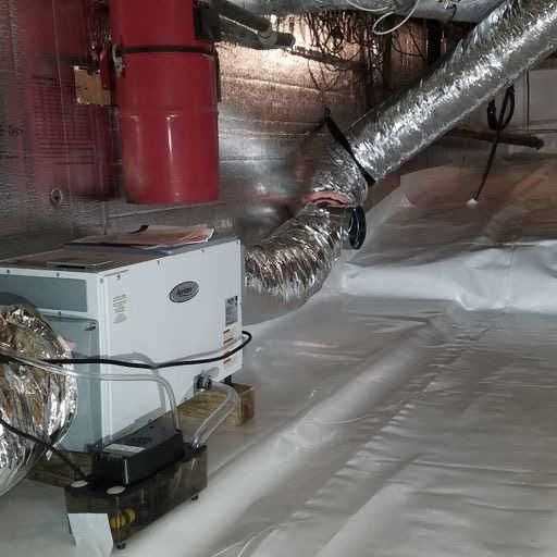 dehumidifier installation and radon mitigation system in crawl space