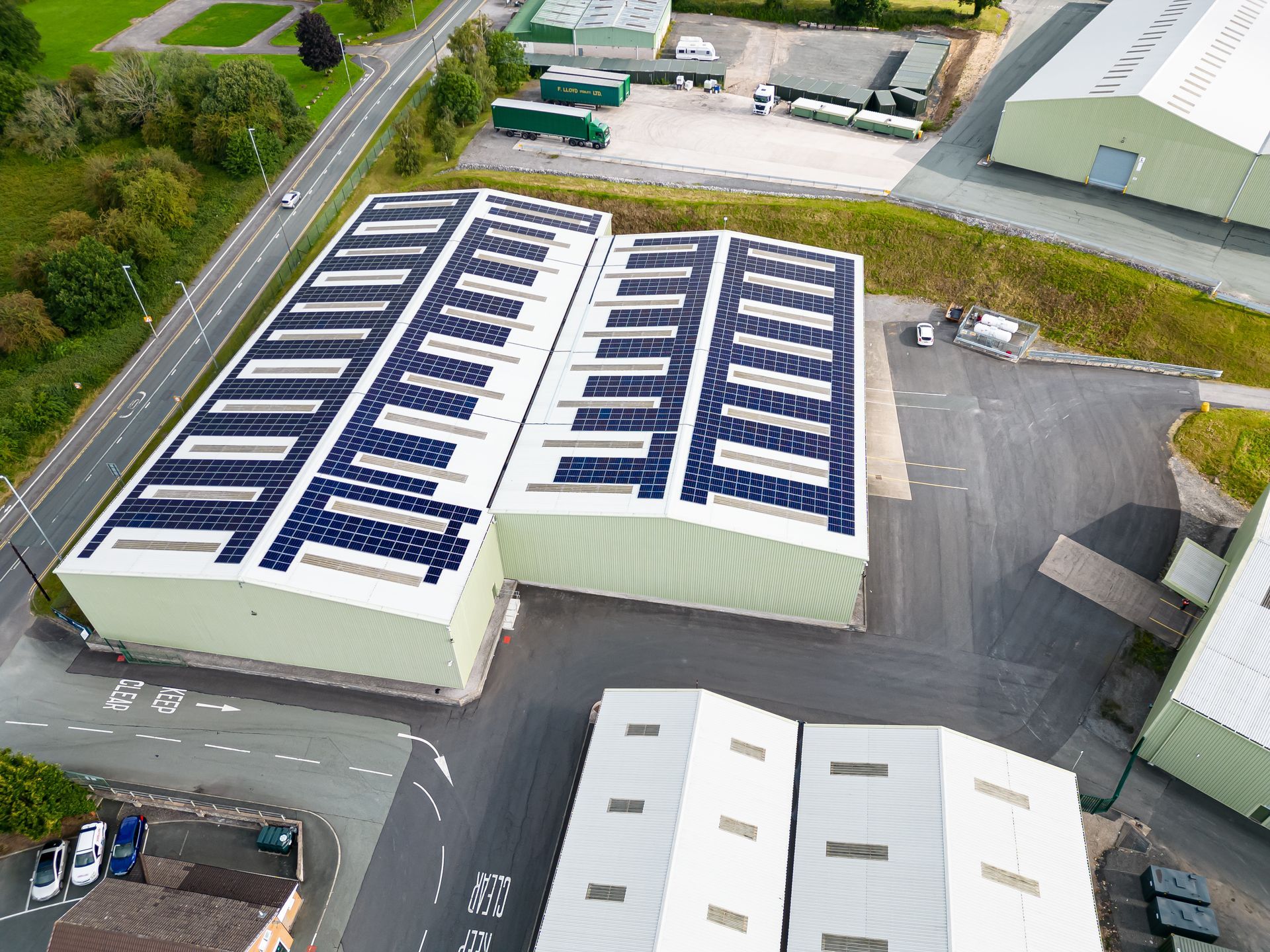 Warehouse with solar panels on the roof at F Lloyd in Wrexham Industrial Estate.