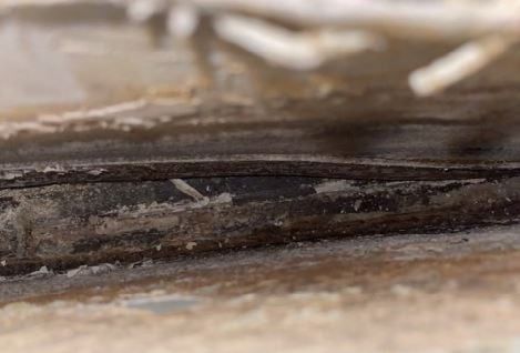 A close up of a piece of metal on a table.