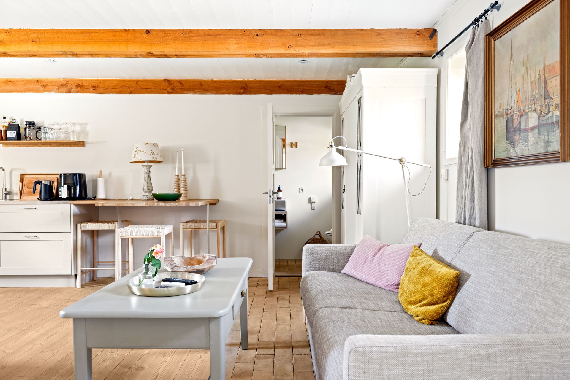 A living room with a couch and a coffee table