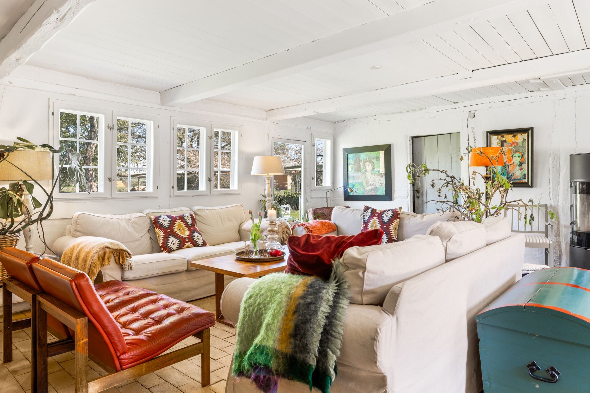 A living room filled with furniture and a couch.