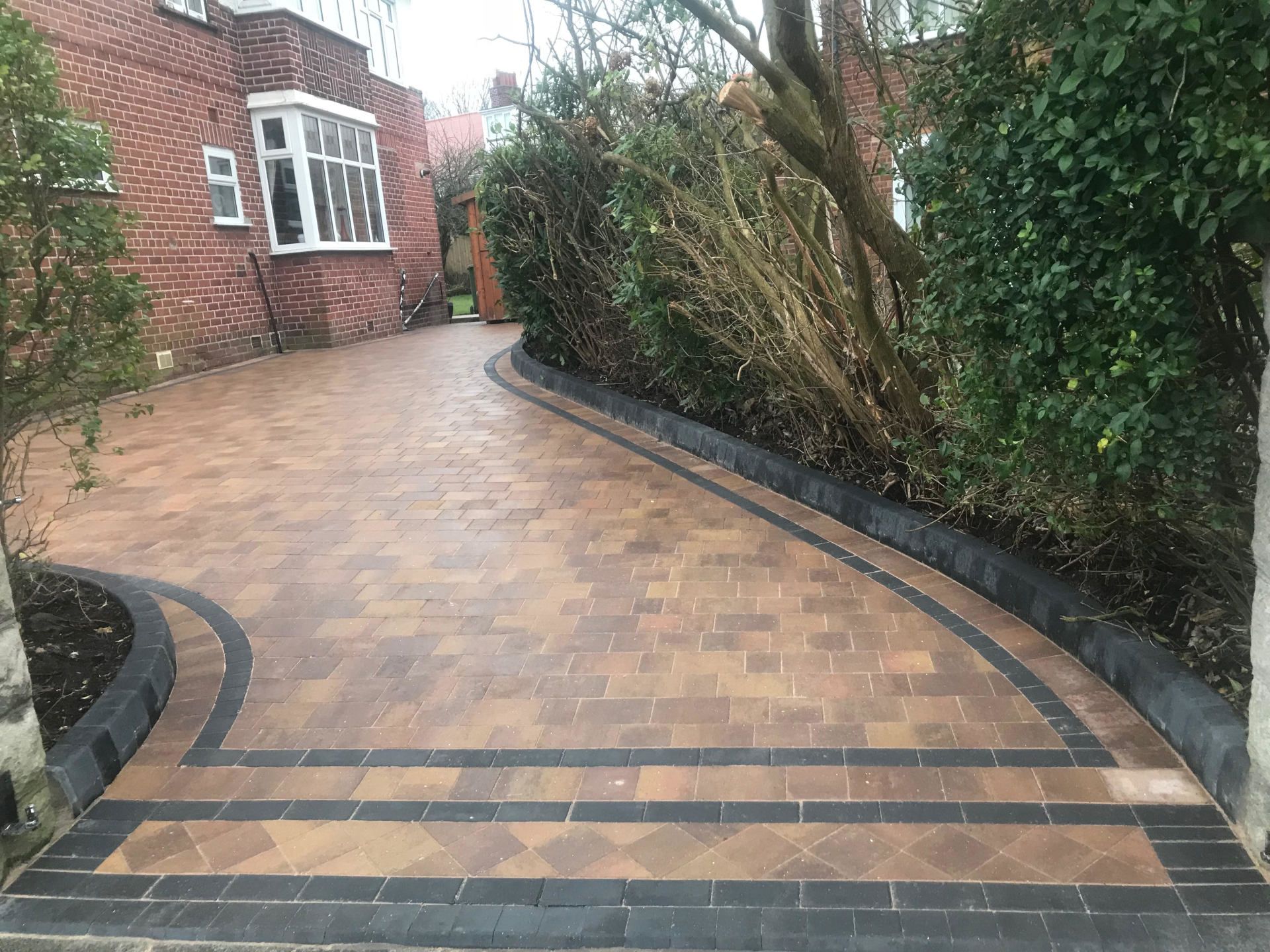 Curved Driveway by Vision Landscape design