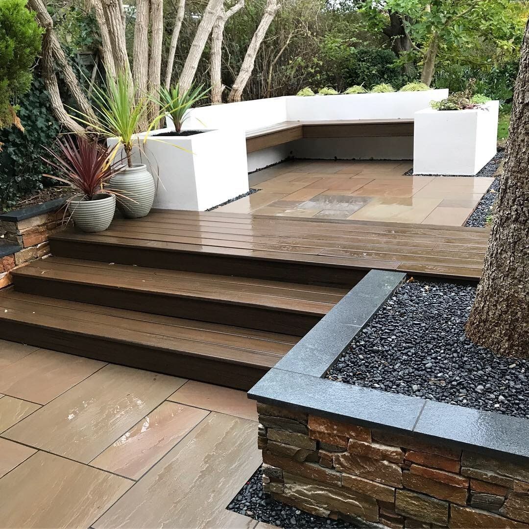 Duel level patio with seating, walls and steps
