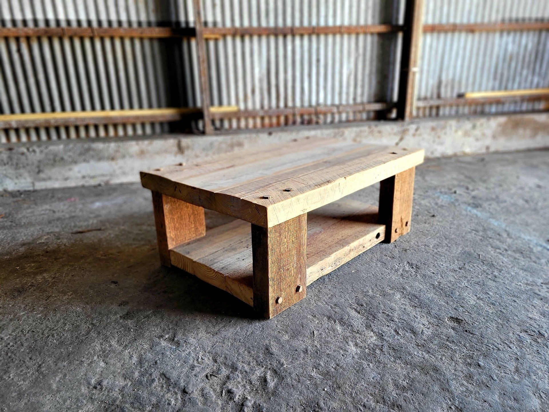 Our unique Big Flat Creeek Coffee table has chunky legs and a chunky top to match. Made with reclaimed heart pine