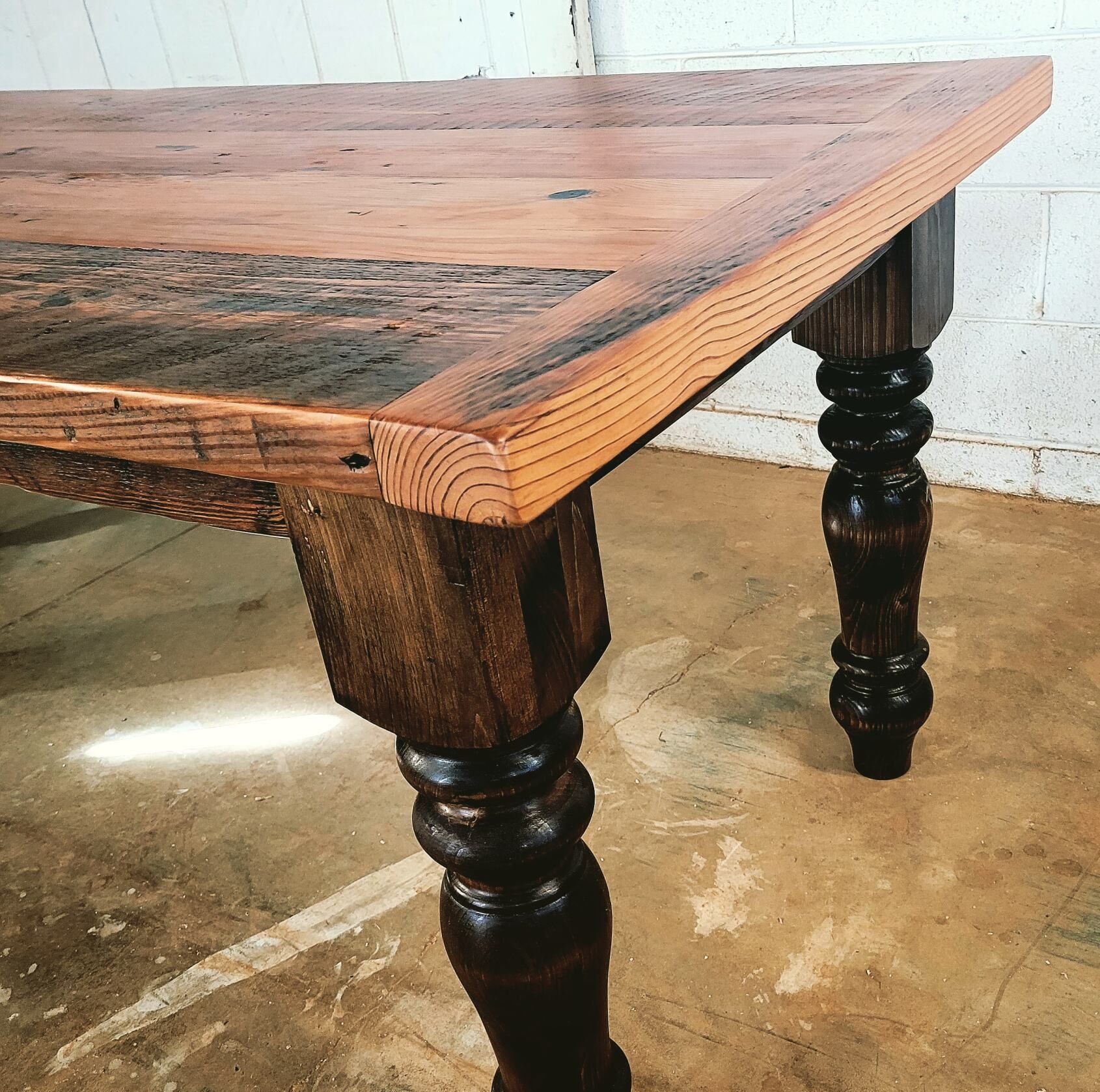 Our French Farmhouse table is timeless. We use 100 year old reclaimed wood and big chunky legs to give it a rustic look.
