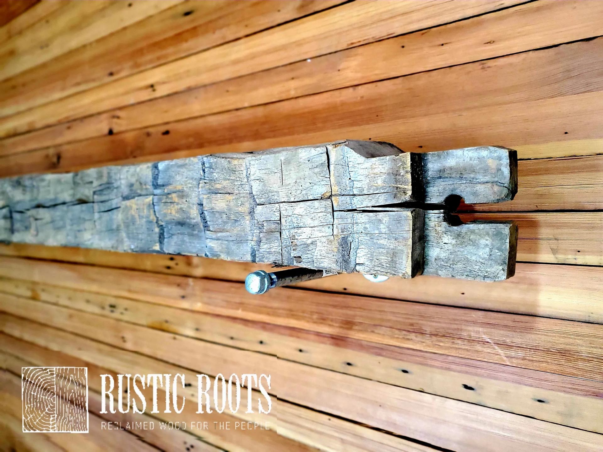 What is a Hand Hewn Reclaimed Wood Beam Mantel