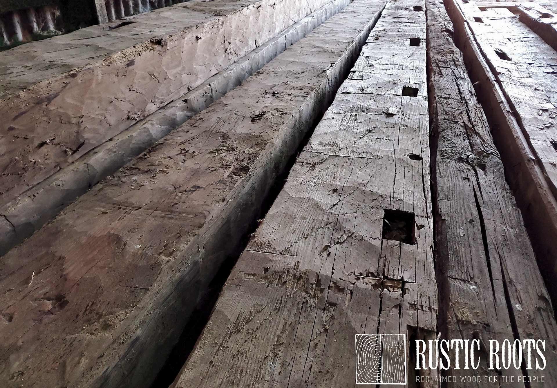 25 to 30 Foot Hand Hewn Old Growth Heart Pine Beams