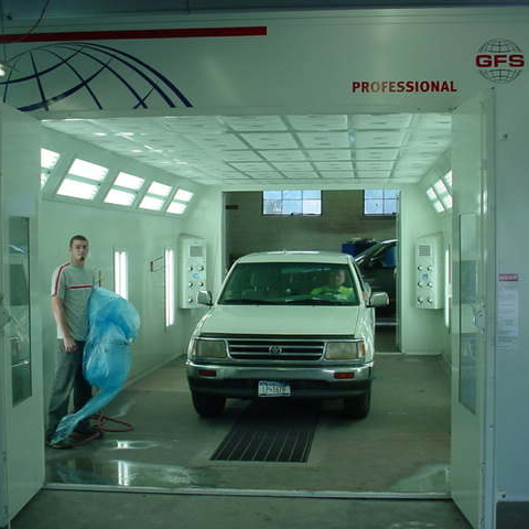 White Car In Paint Booth