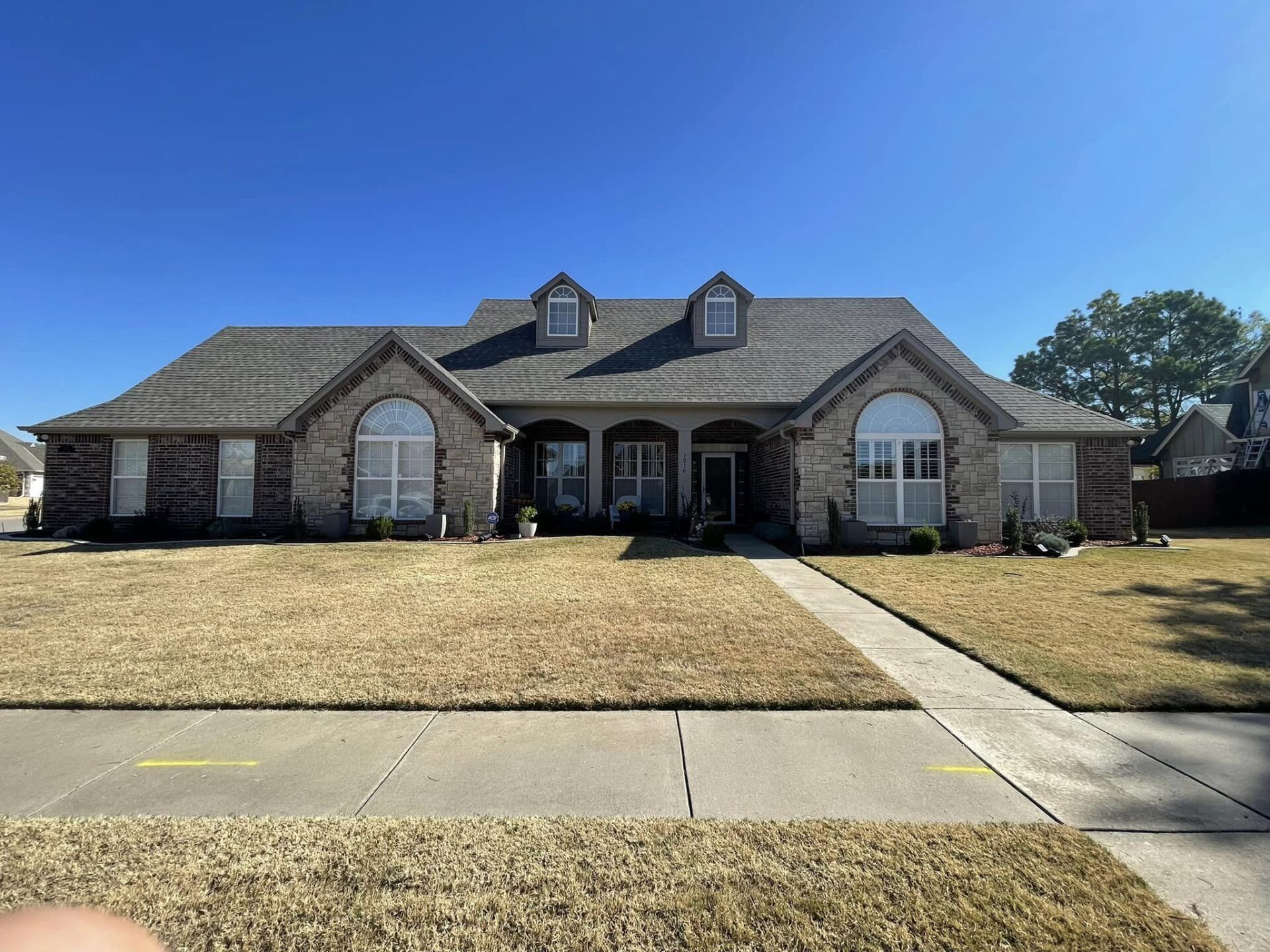 Front view of house with new siding