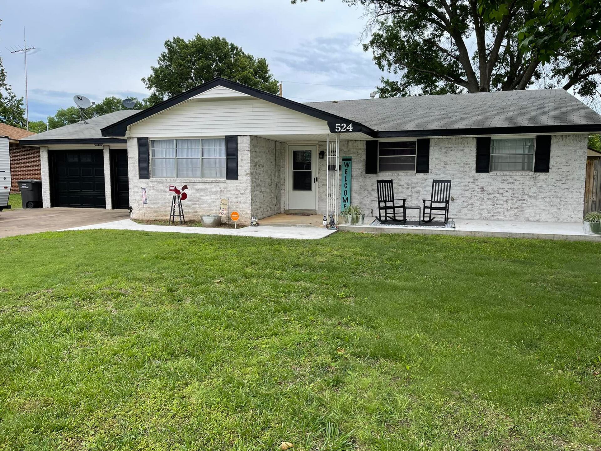 Residential white house with paint