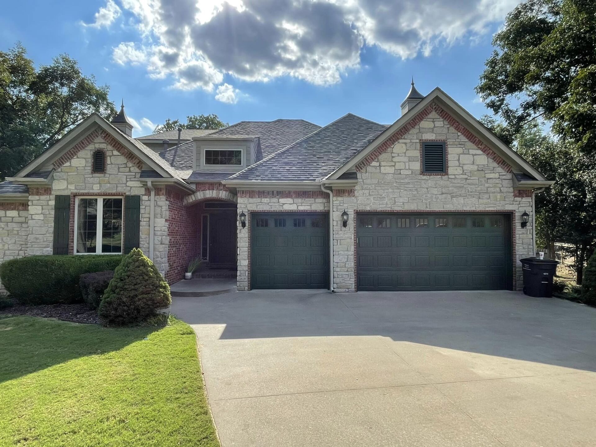 Front view of home with new garage paint