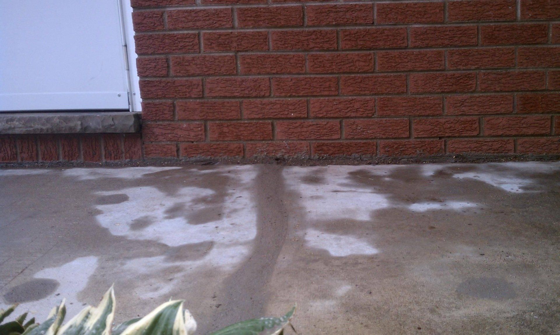 After Fixing Crack in Concrete Floor — Rockford, IL — Northern Illinois Concrete Lifting