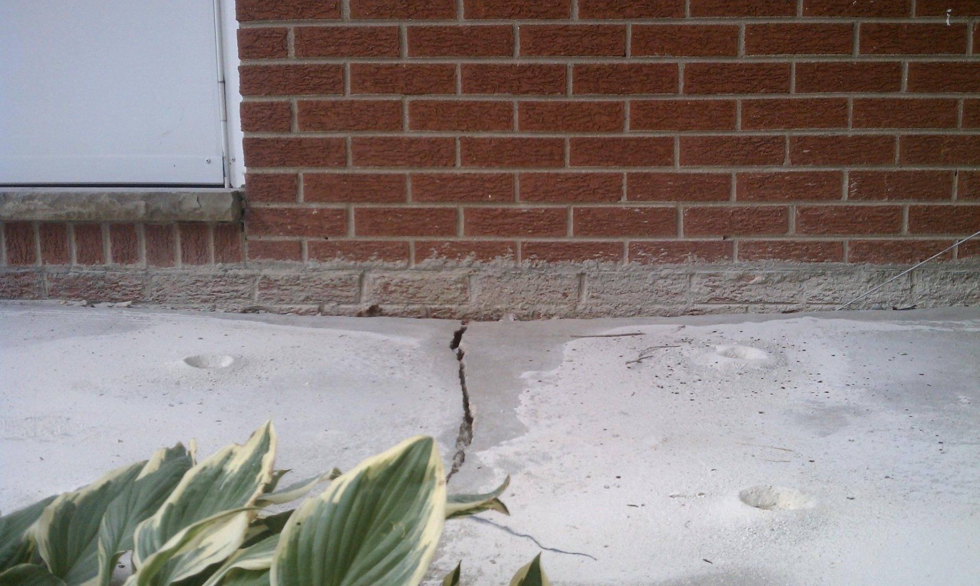 Crack in Concrete Floor — Rockford, IL — Northern Illinois Concrete Lifting