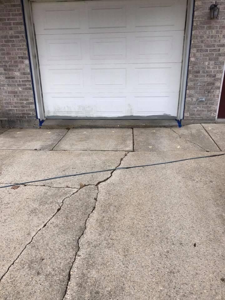 Crack in Garage Driveway — Rockford, IL — Northern Illinois Concrete Lifting