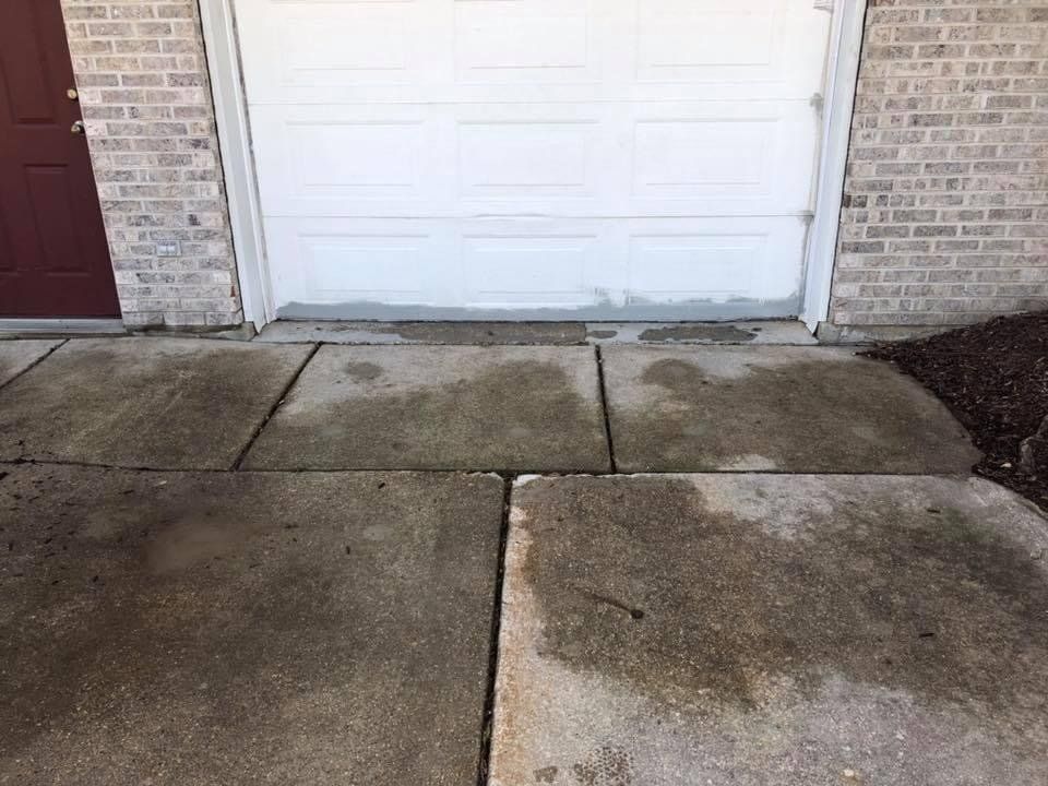 Wet Garage Driveway — Rockford, IL — Northern Illinois Concrete Lifting