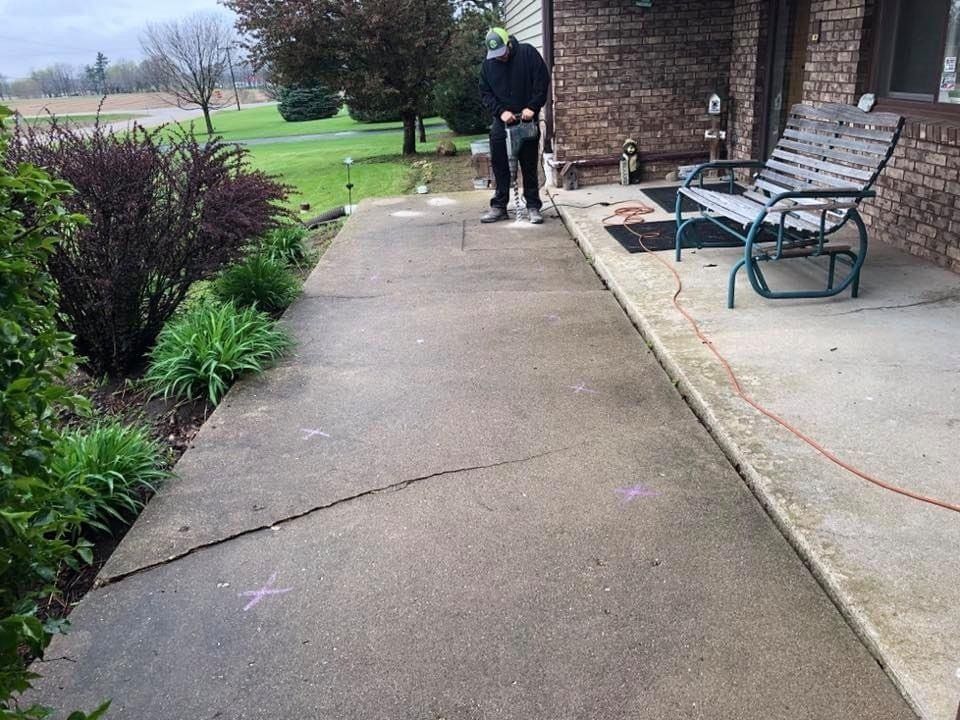 Man Standing on Patio — Rockford, IL — Northern Illinois Concrete Lifting