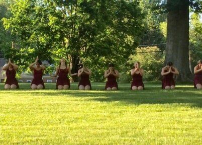 Dancers Praying on field - Dance Studio in TriCities, TN