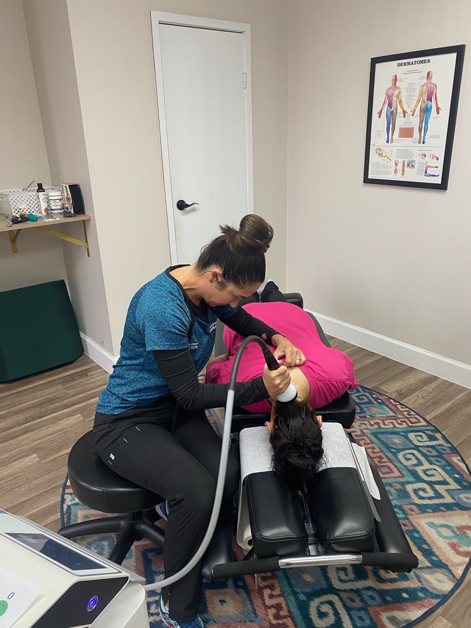 Patient receiving a gentle neck adjustment at Champion Chiropractic of Pasadena in Pasadena, TX for stress relief.