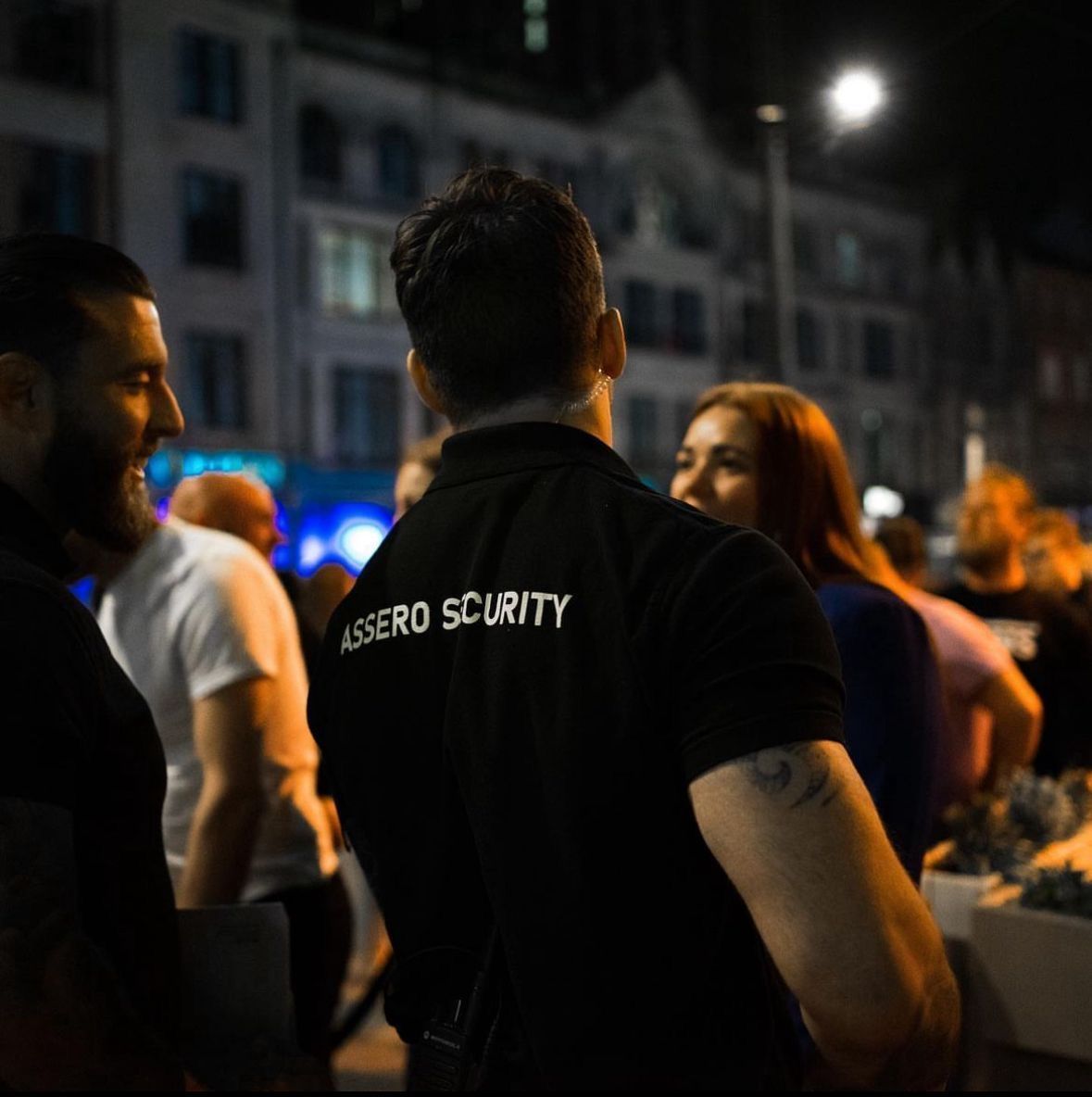Security guard in black shirt with 