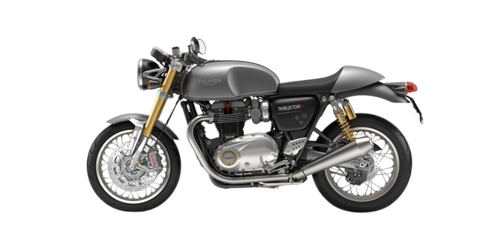 A triumph motorcycle is shown on a white background.
