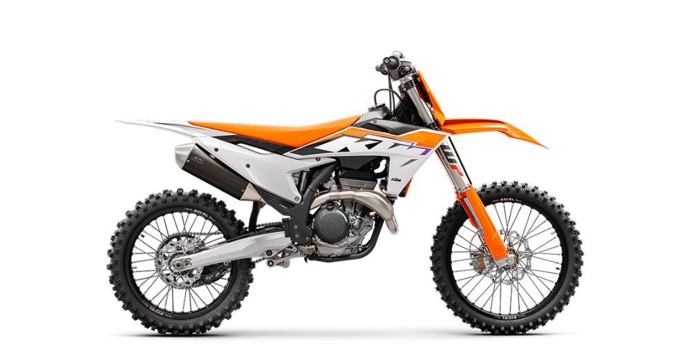 A white and orange dirt bike on a white background.