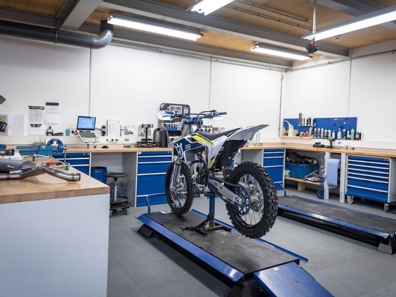 a husqvarna motorcycle being assembled