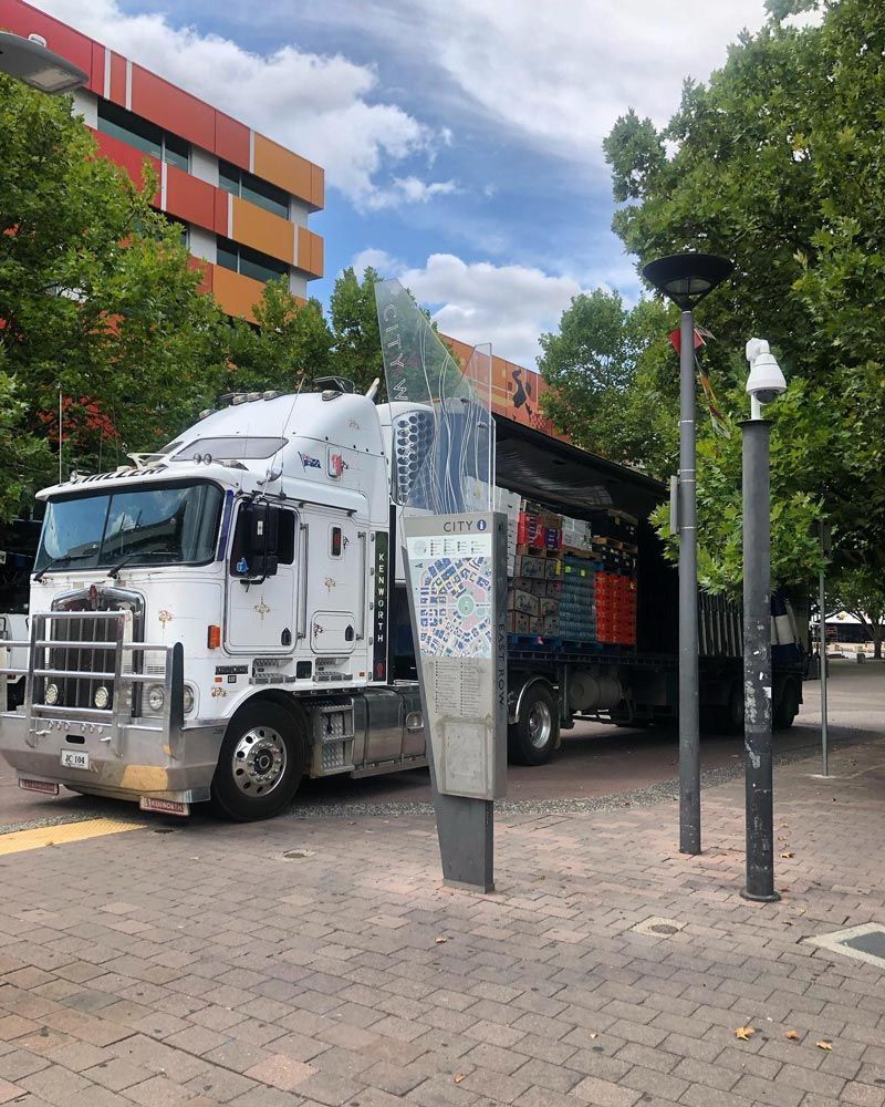 Transport Truck Parked by the Footpath — Joe Camilleri Transport in Canberra, ACT