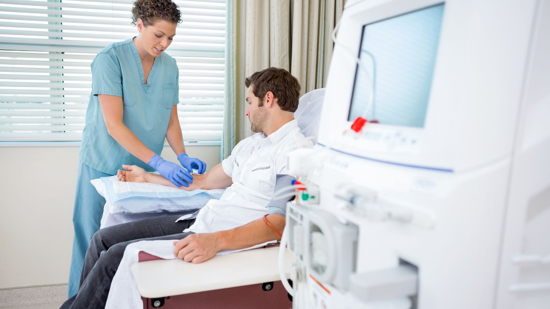A nurse is giving a patient an injection in a hospital room