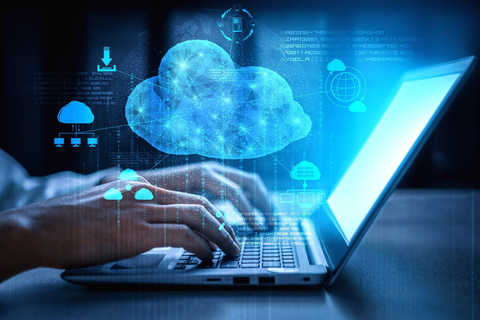 A person using managed IT solutions, typing on a laptop with a cloud in the background.