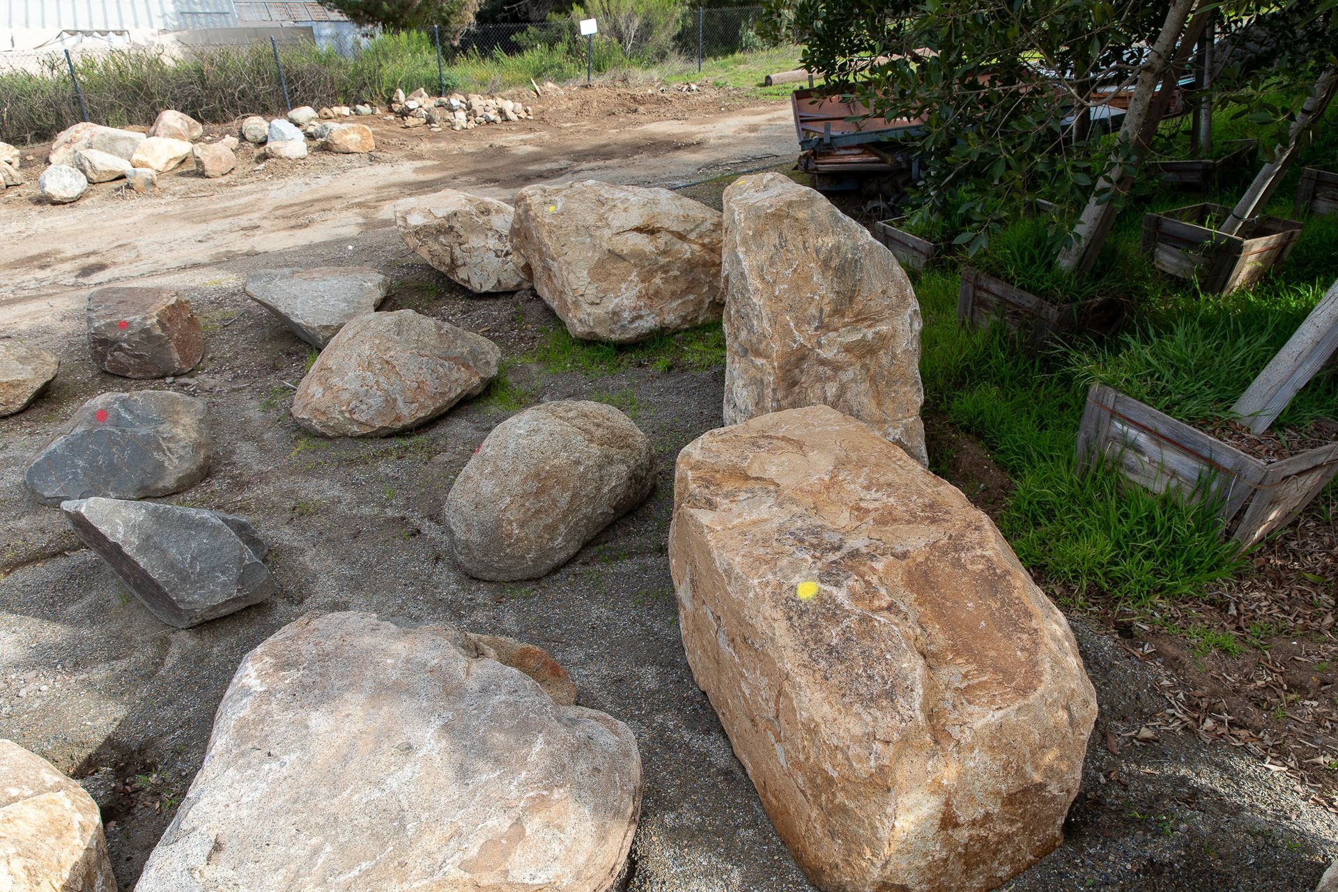 A bunch of rocks are laying on the ground