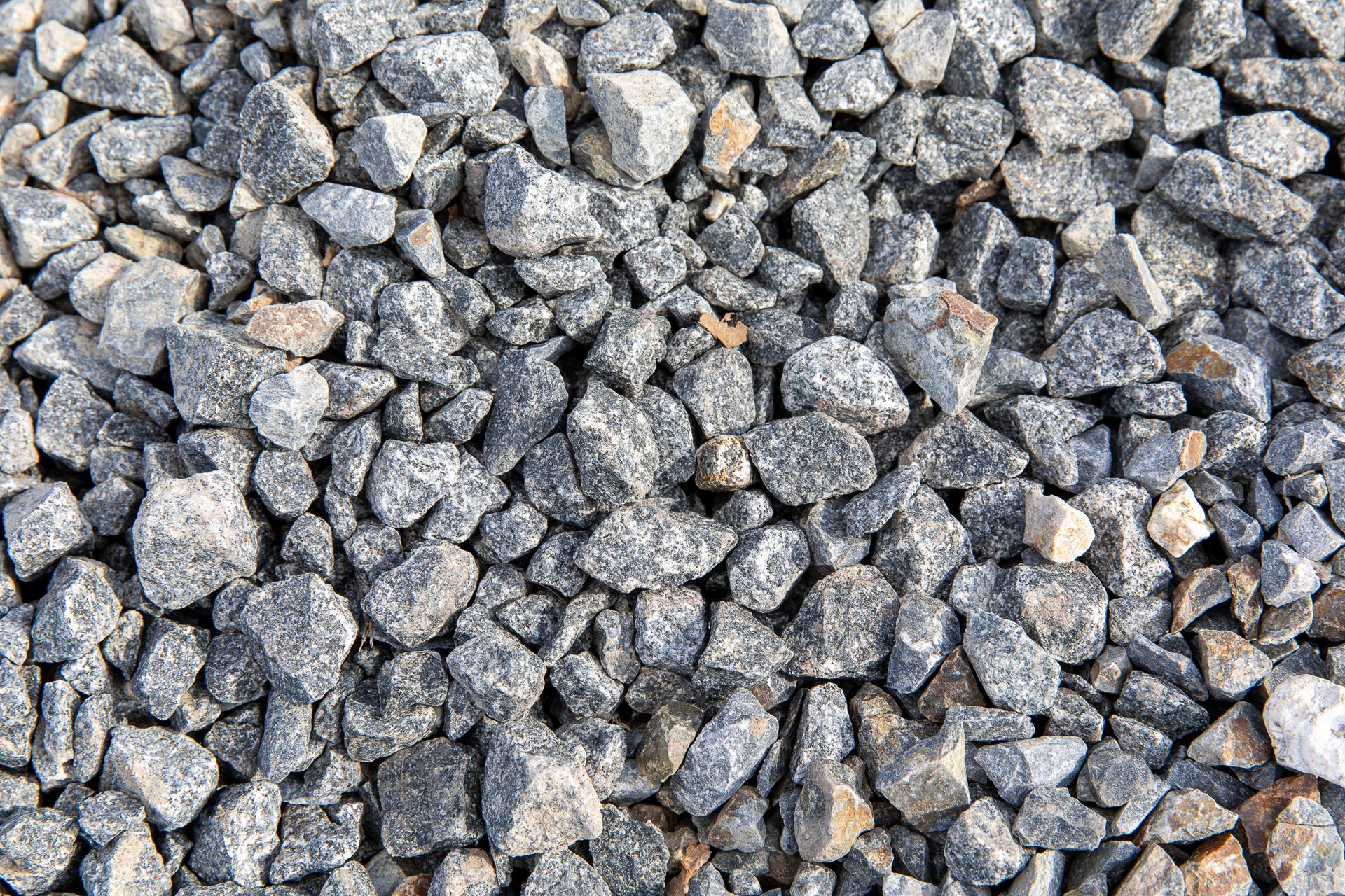 A pile of gravel is sitting on the ground