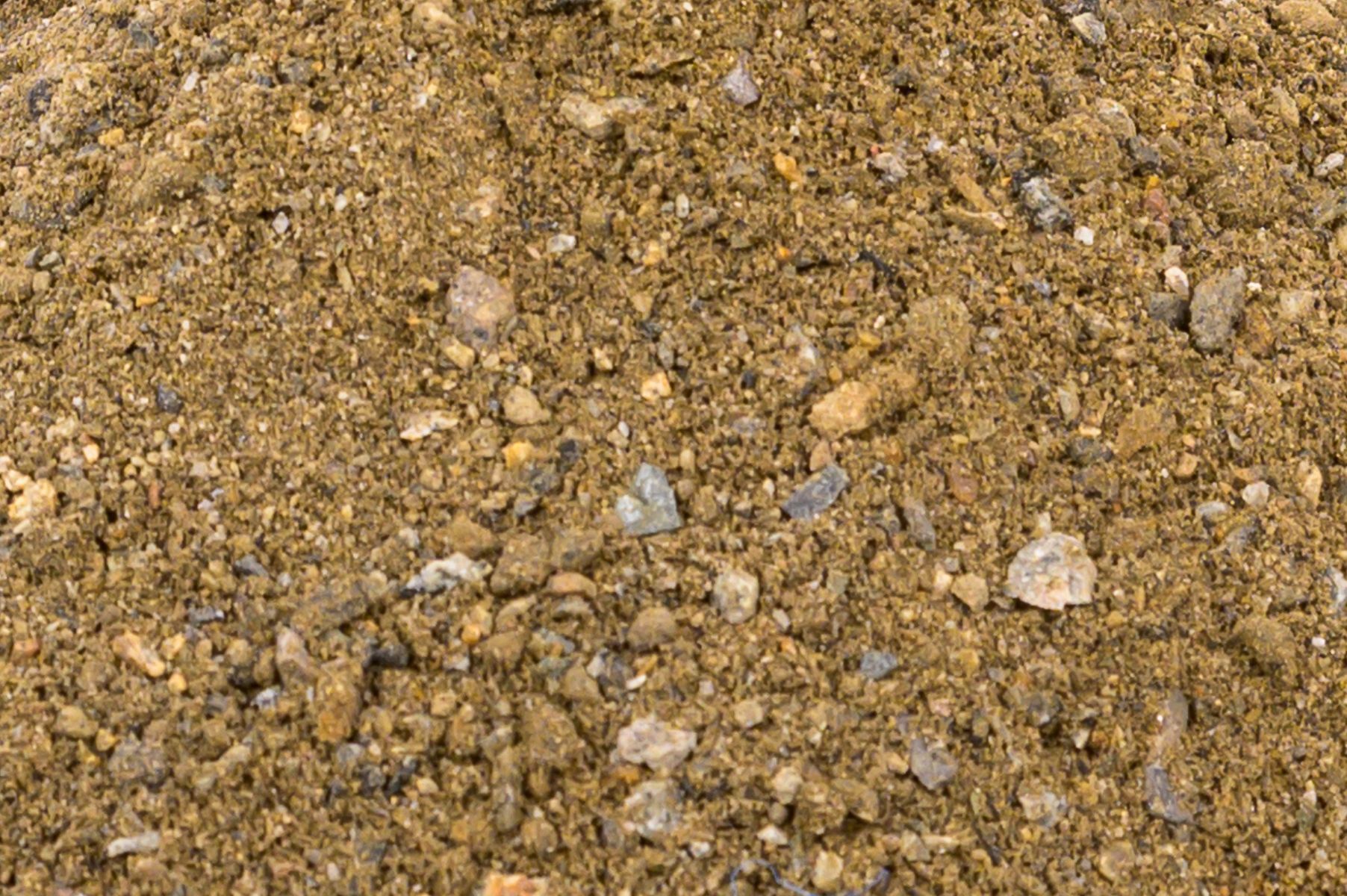 A close up of a pile of dirt and rocks.