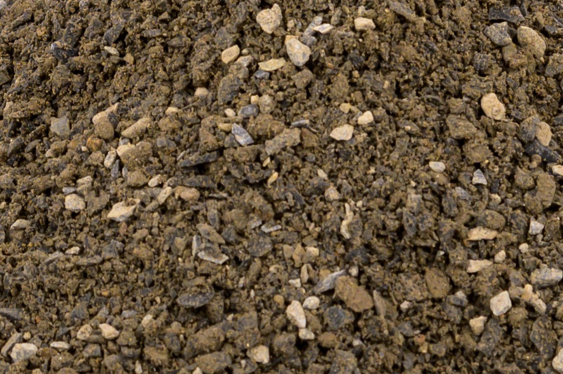 A close up of a pile of dirt and rocks.