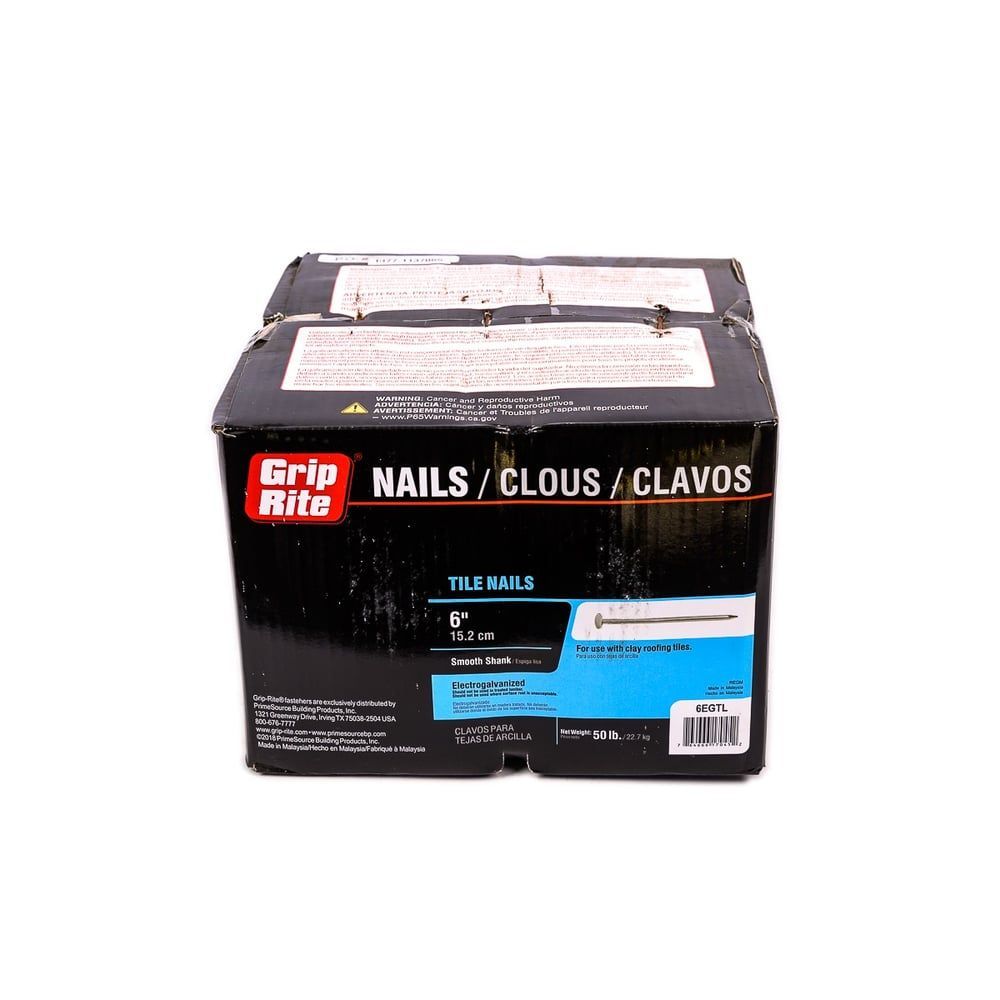 A box of grip rite nails on a white background