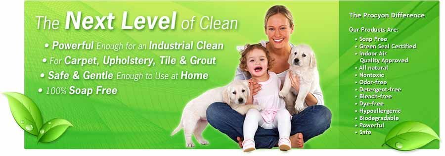 A woman and child are sitting on the floor with two dogs.