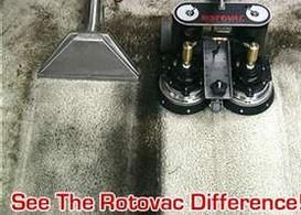 A machine is cleaning a carpet with the words `` see the rotovac difference ''.