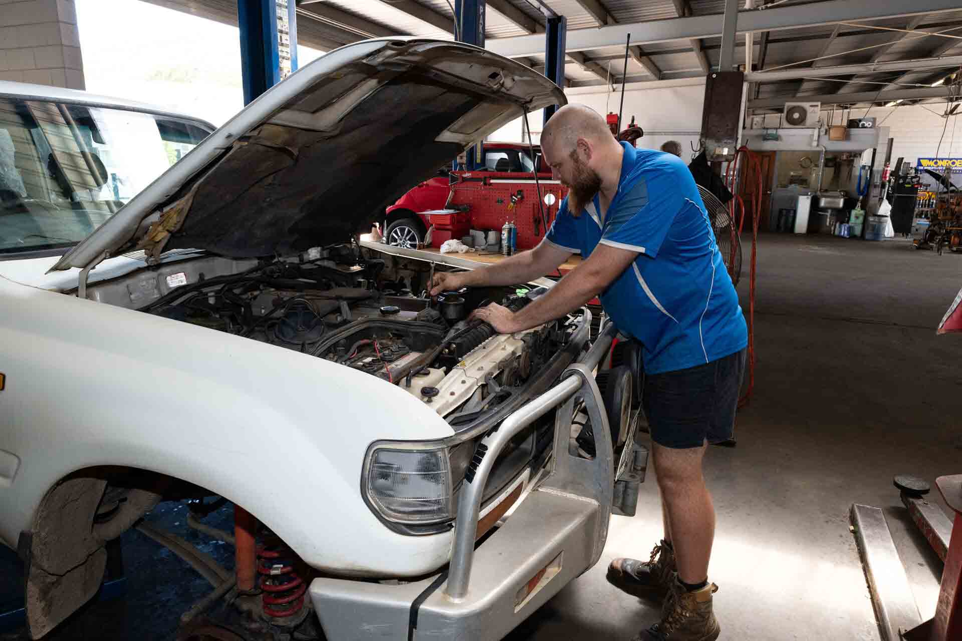 Mechanic Working on Car Engine — Bob Parkes Automotive In Hyde Park, QLD