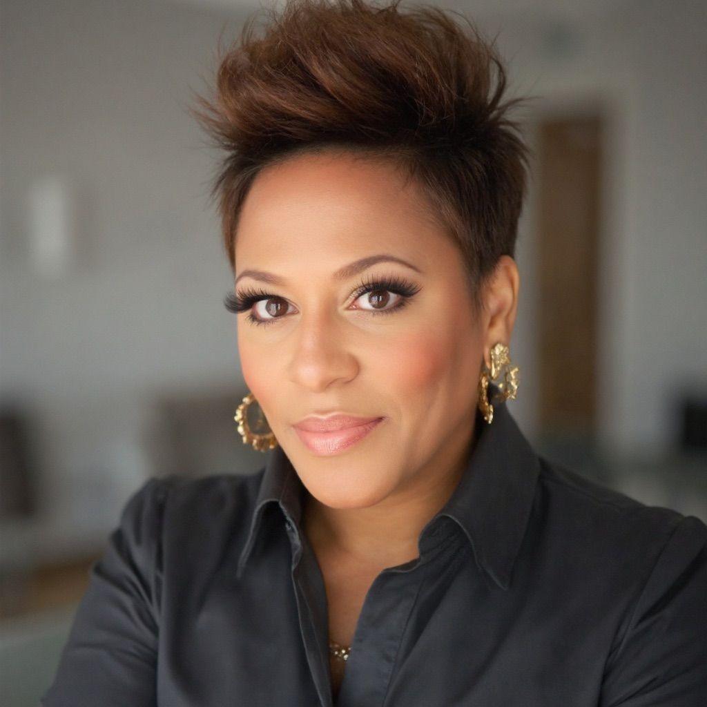 A woman standing at the opening of a door.