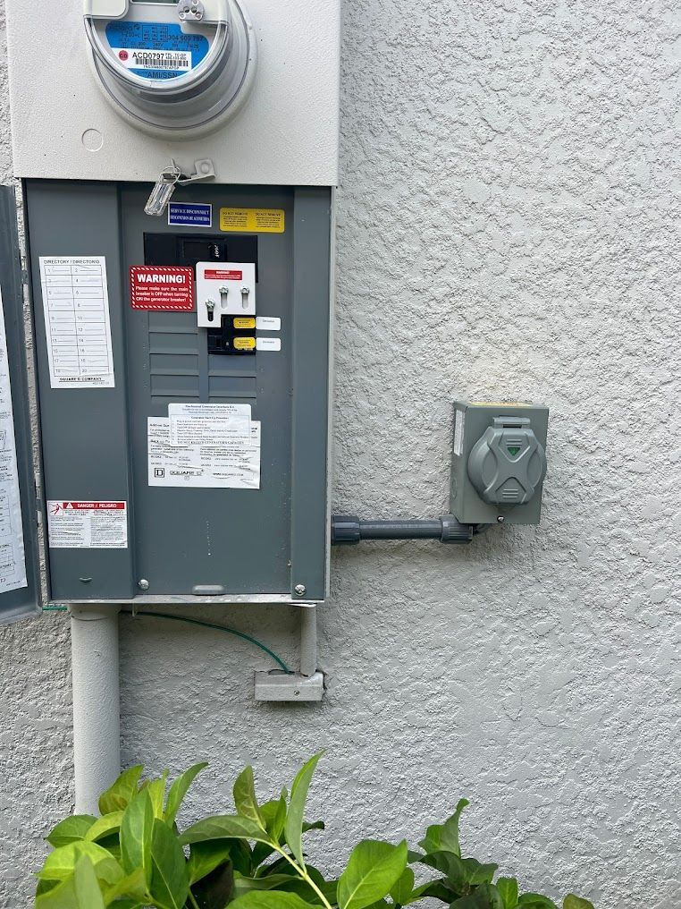 a electrical box is attached to the side of a building