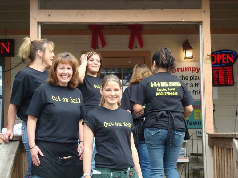 A group of women wearing black shirts that say get on rail