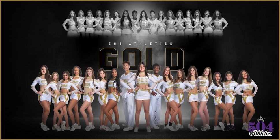 A group of cheerleaders are posing for a picture with the word gold in the background