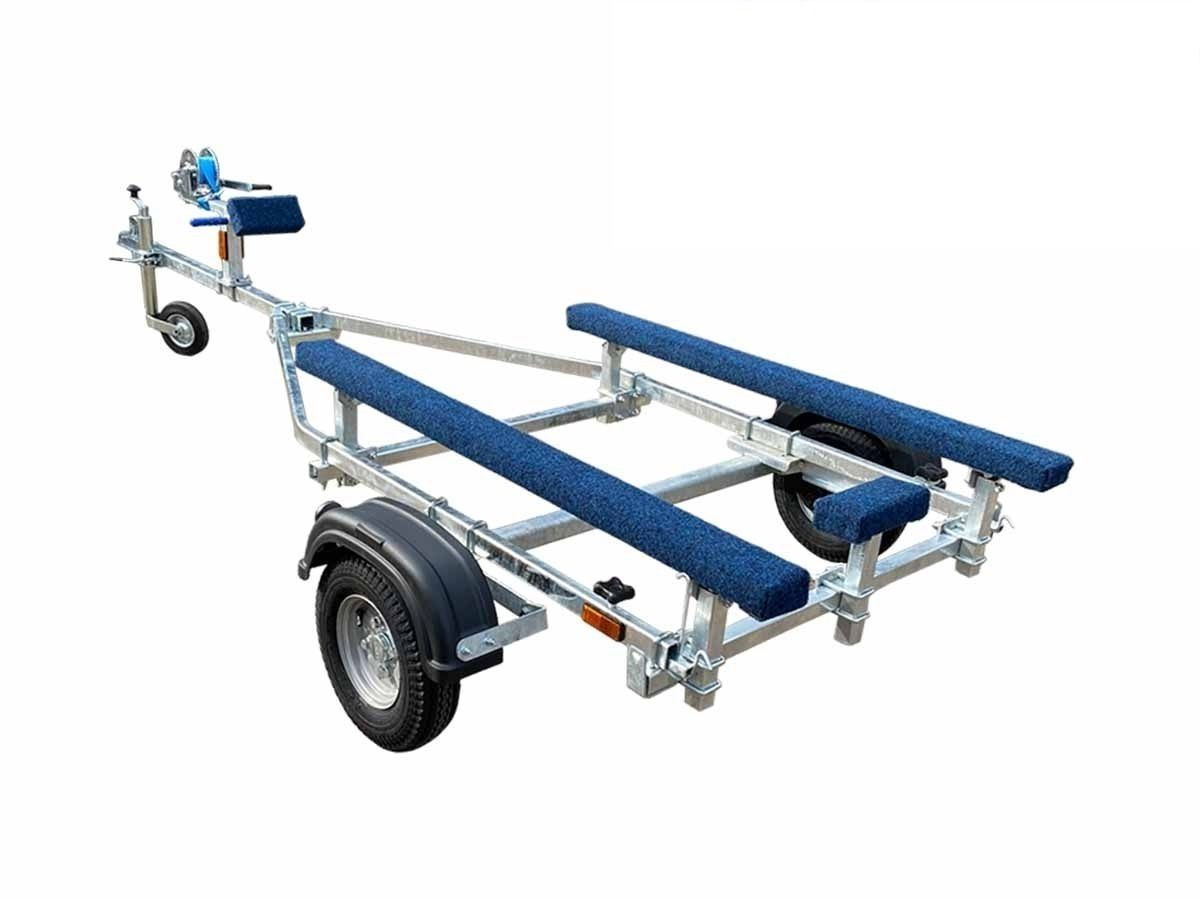 a boat trailer with blue seats and wheels on a white background .