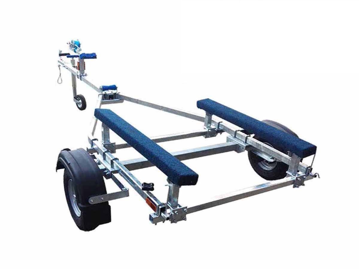 a boat trailer with blue seats and wheels on a white background .