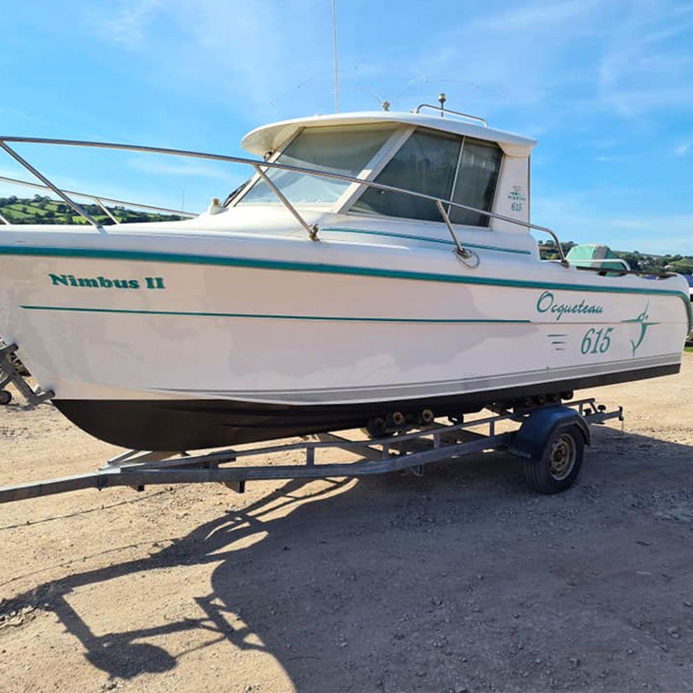 a boat on a trailer with the number 615 on it