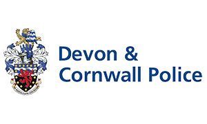 the devon and cornwall police logo has a coat of arms on it .