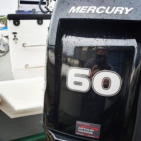 a mercury outboard motor with the number 60 on it