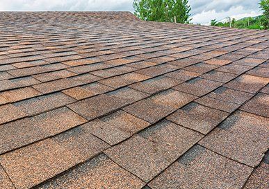Roofing Contractors — Shingles Roofing in Redding, CA