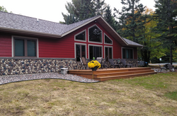 Nice small red house with stone siding — Cheyenne, WY — Frontier Siding Supply