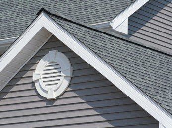 Close shot of gray house siding and roof — Cheyenne, WY — Frontier Siding Supply